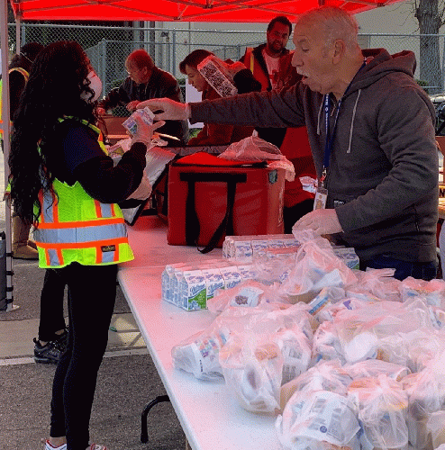 LAUSD Board Member Scott Schmerelson helping out at a Grab and Go Meals site., From Uploaded