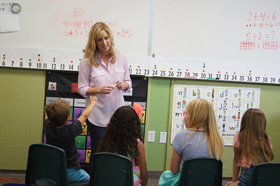 Christy Smith reading to children, From InText