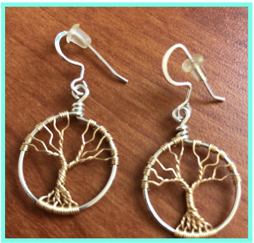 my Tree of Life earrings, made by a local artisan, hold extra meaning these days