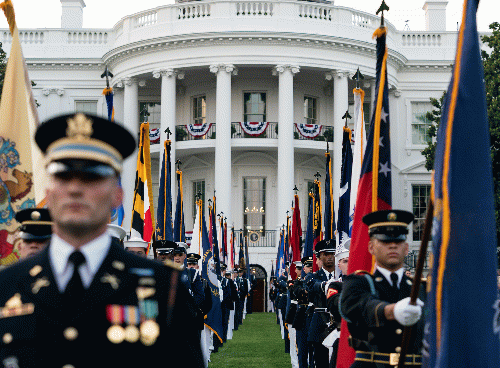 Honor Guard stands at attention on South Lawn of White House during a flyover by the U.S. Air Force Thunderbirds and the U.S. Navy Blue Angels, July 4, 2020., From Uploaded