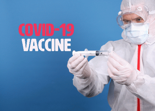 Doctor holding syringe with Covid-19 Vaccine, From CreativeCommonsPhoto