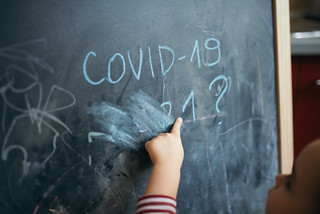 Baby hand on chalkboard by Nenad Stojkovic via Flickr, From Uploaded