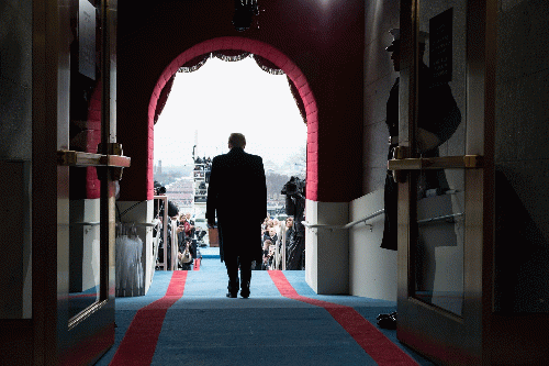 President-elect Donald Trump walks to take his seat for the inaugural swearing-in ceremony at the U.S. Capitol in Washington, D.C., Friday, Jan. 20, 2017. (Official White House Photo by Shealah Craighead), From Uploaded