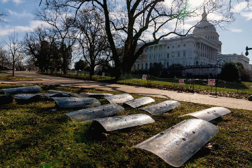 Riot shields lying on a lawn on Capitol Hill, From Uploaded