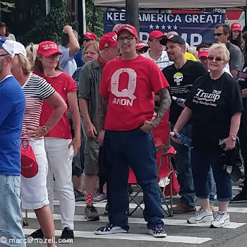 QAnon in red shirt