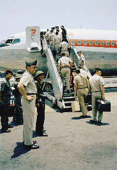 SAIGON 1973 - In a curious ending to a bizarre conflict, American troops boarded jets under the watchful eyes of North Vietnamese and Viet Cong observers in Saigon, From CreativeCommonsPhoto