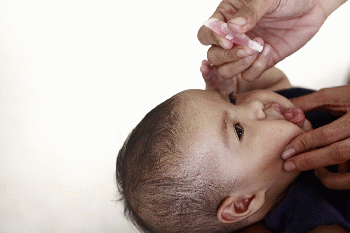 A child receives an oral vaccine, From CreativeCommonsPhoto