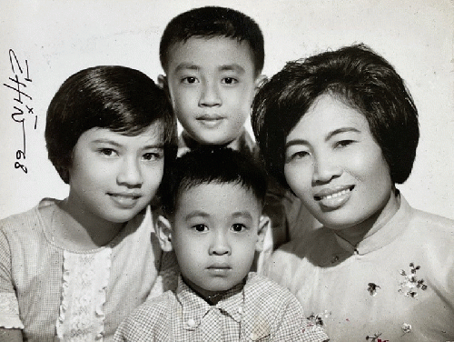 Tráº§n VÅ©, center front, with his family in Saigon in 1968