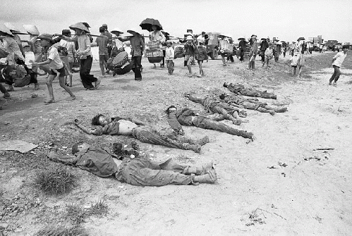 Quang Tr 1972 - Dead Soldiers on Side of Road. It is likely that Google will demonetize this article because of this image., From FlickrPhotos