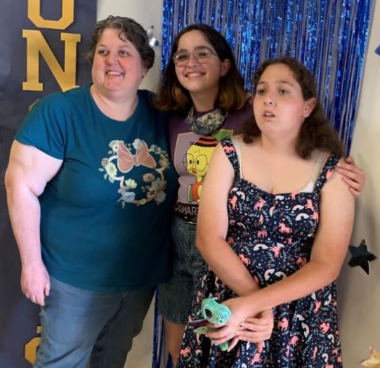 Zoey celebrates with her mom and one of her sisters, From Uploaded