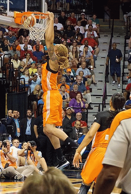 At 6'8., Griner dunking at the WNBA 2015 All-Star game. And when just now, she got back on the court shortly after she got home, she demonstrated that she still can., From WikimediaPhotos