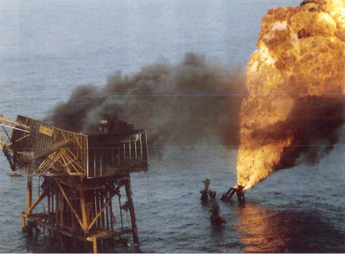 Figure 5: Piper Alpha oil rig fire damages after explosions - Most of the oil rig sunk into the North Sea., From Uploaded