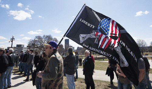 Gun Owners Rally flag with a human skull, From CreativeCommonsPhoto
