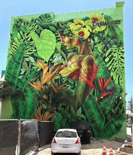 Public murals adorn downtown buildings in George Town