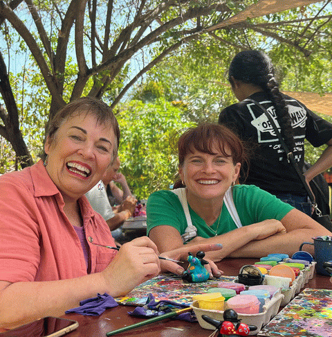 The author, Meryl Ann Butler (L) and Serena Janet Israel (R) in Serena's outdoor art workshop The author, Meryl Ann Butler (L) and Serena Janet Israel (R) in Serena's outdoor art workshop