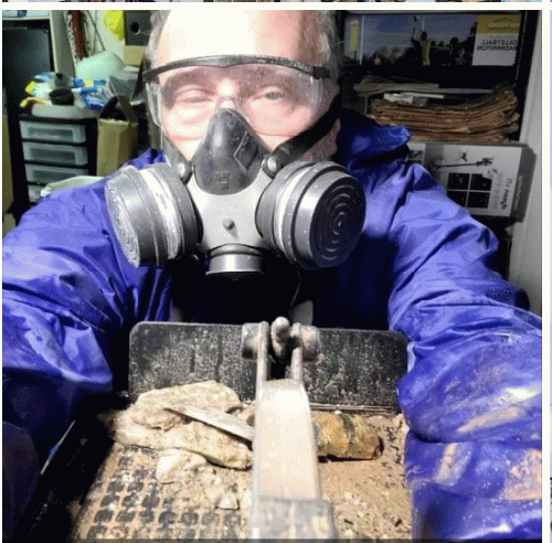 Me working at my lapidary ' Diamond wet saw. I've since added a hat to my gear. Some stones throw sharp chips. Me working at my lapidary ' Diamond wet saw. I've since added a hat to my gear. Some stones throw sharp chips.