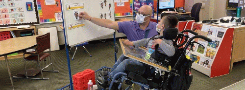 A teacher and student at the Sven Lokrantz Special Education Center, a school that would be protected by the proposed Improving Special Education resolution A teacher and student at the Sven Lokrantz Special Education Center, a school that would be protected by the proposed Improving Special Education resolution
