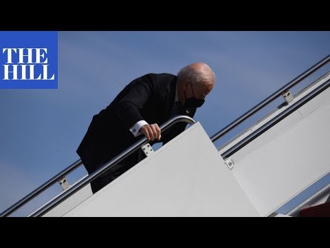 #BREAKING: President Joe Biden FALLS multiple times while boarding Air Force One President Joe Biden trips and falls on the stairs multiple times while boarding Air Force One en route Atlanta, Georgia. Later in the ..., From YouTubeVideos