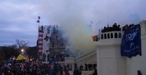 Tear gas outside the United States Capitol on 6 January 2021. Photo by Tyler Merbler. Creative Commons Attribution 2.0 Generic license. Tear gas outside the United States Capitol on 6 January 2021. Photo by Tyler Merbler. Creative Commons Attribution 2.0 Generic license.