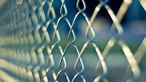 Chainlink Prison Fence--of bigotry barring U.S. citizens from their most sacred right in democracy